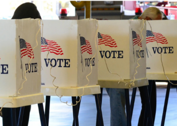Voting Ballots. Democrats Gain Major 20-Point Advantage Over Republicans on Health Care Costs, Poll Finds
