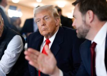 Senate Majority Leader John Thune sits alongside President Donald Trump and Vice President JD Vance. PHOTO: John Thune